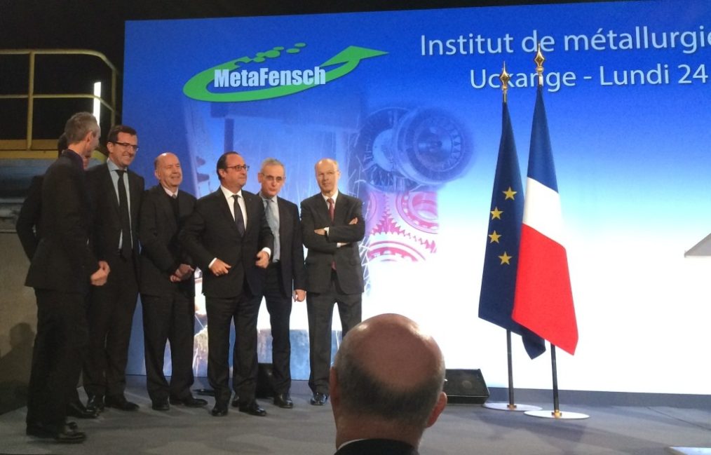 President Hollande and François Mudry, surrounded by representatives of the companies involved in the Metafensch platform.