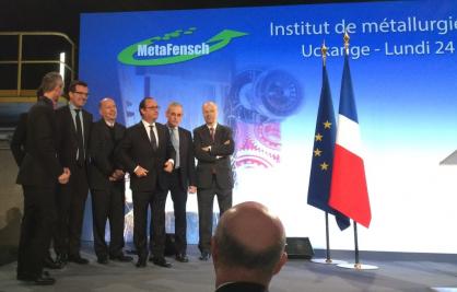 President Hollande and François Mudry, surrounded by representatives of the companies involved in the Metafensch platform.