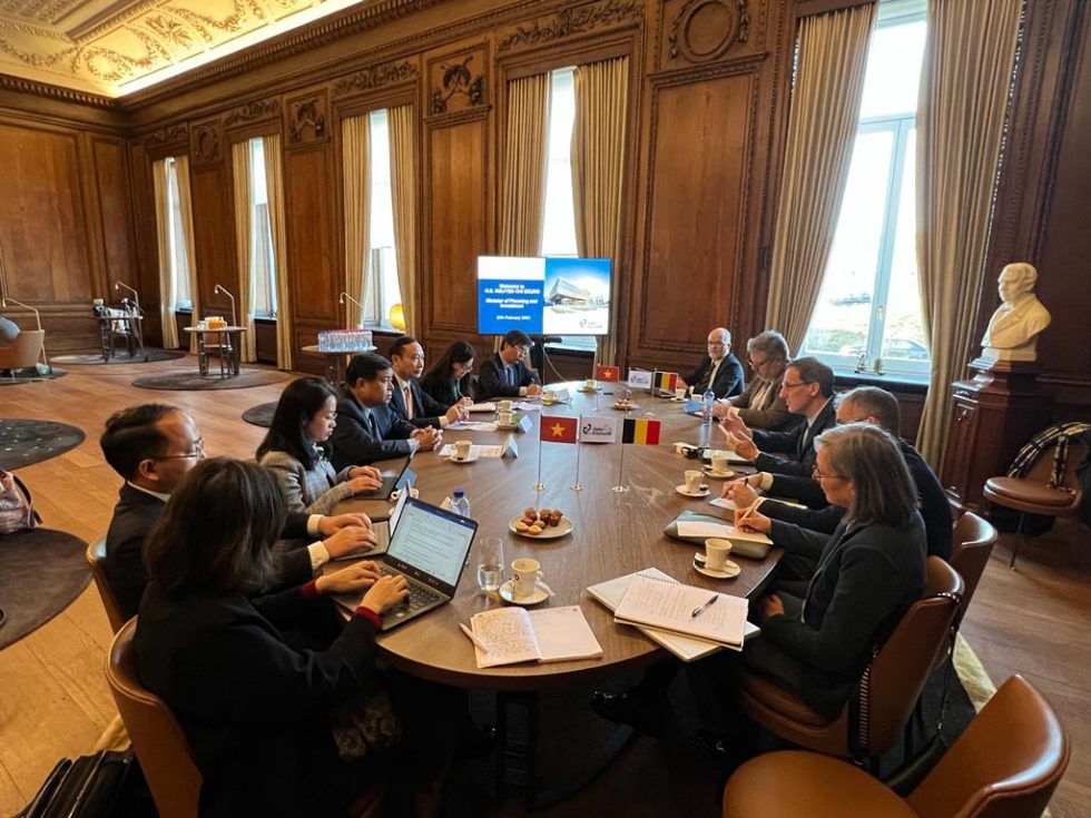vietnamese people around table for business meeting