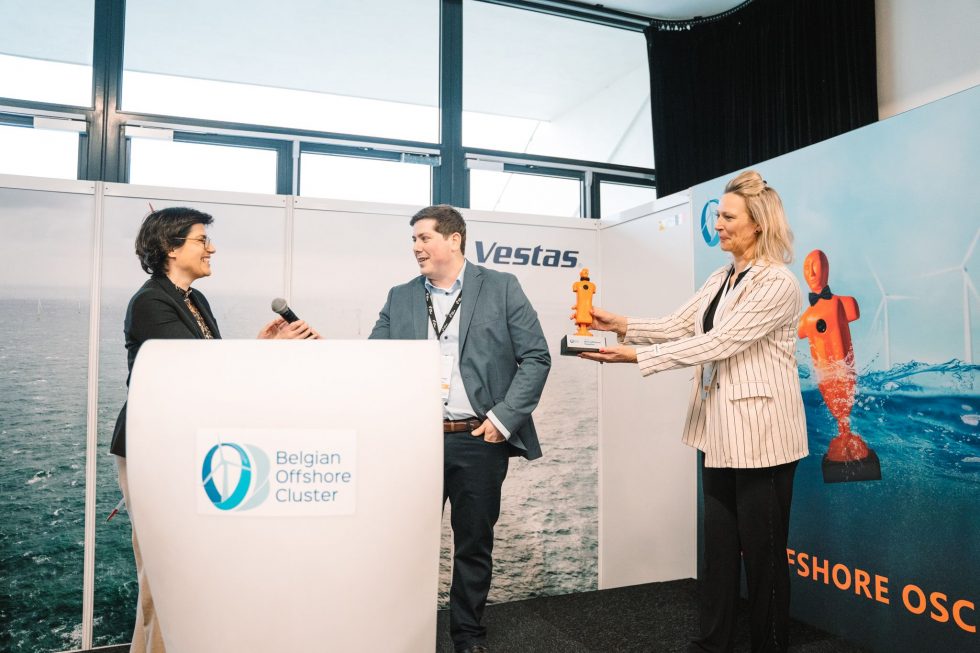 guy receiving a prize